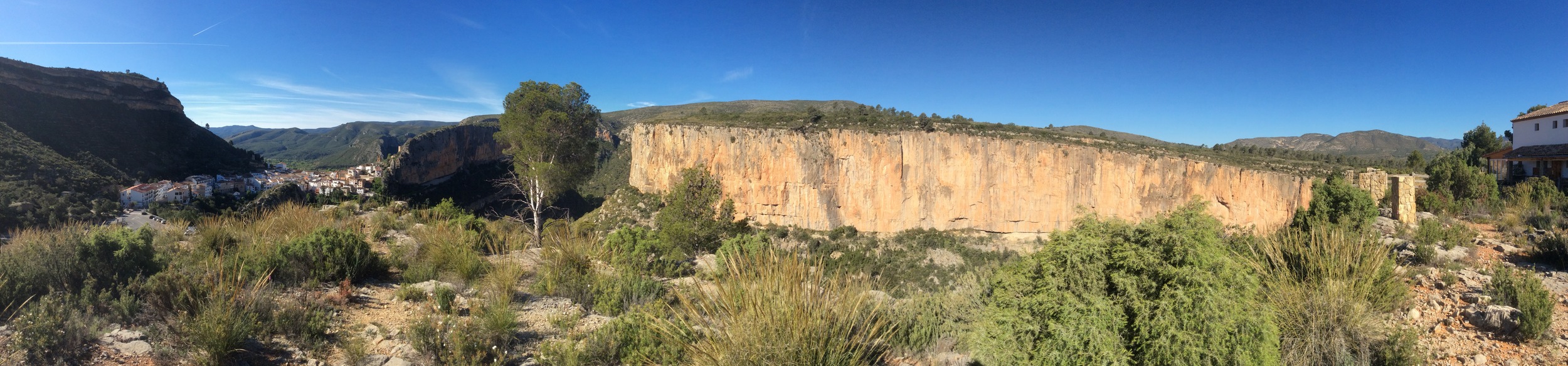 The view from the balcony of El Altico refugio/hostel. Chulilla village on the left, one of the valleys across the middle, and the corner of the accommodation on the right.