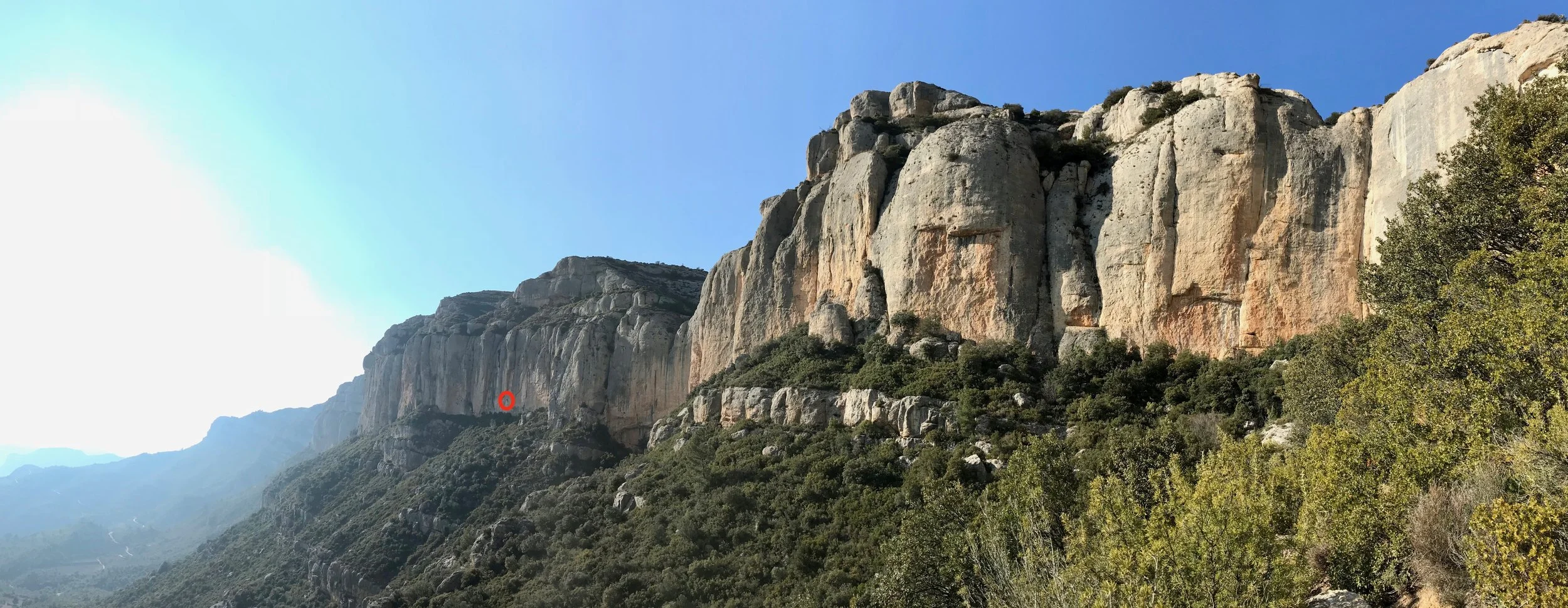 The left-hand edge of Raco de Mist at Monstant. I've circled a climber to give a sense of scale.....