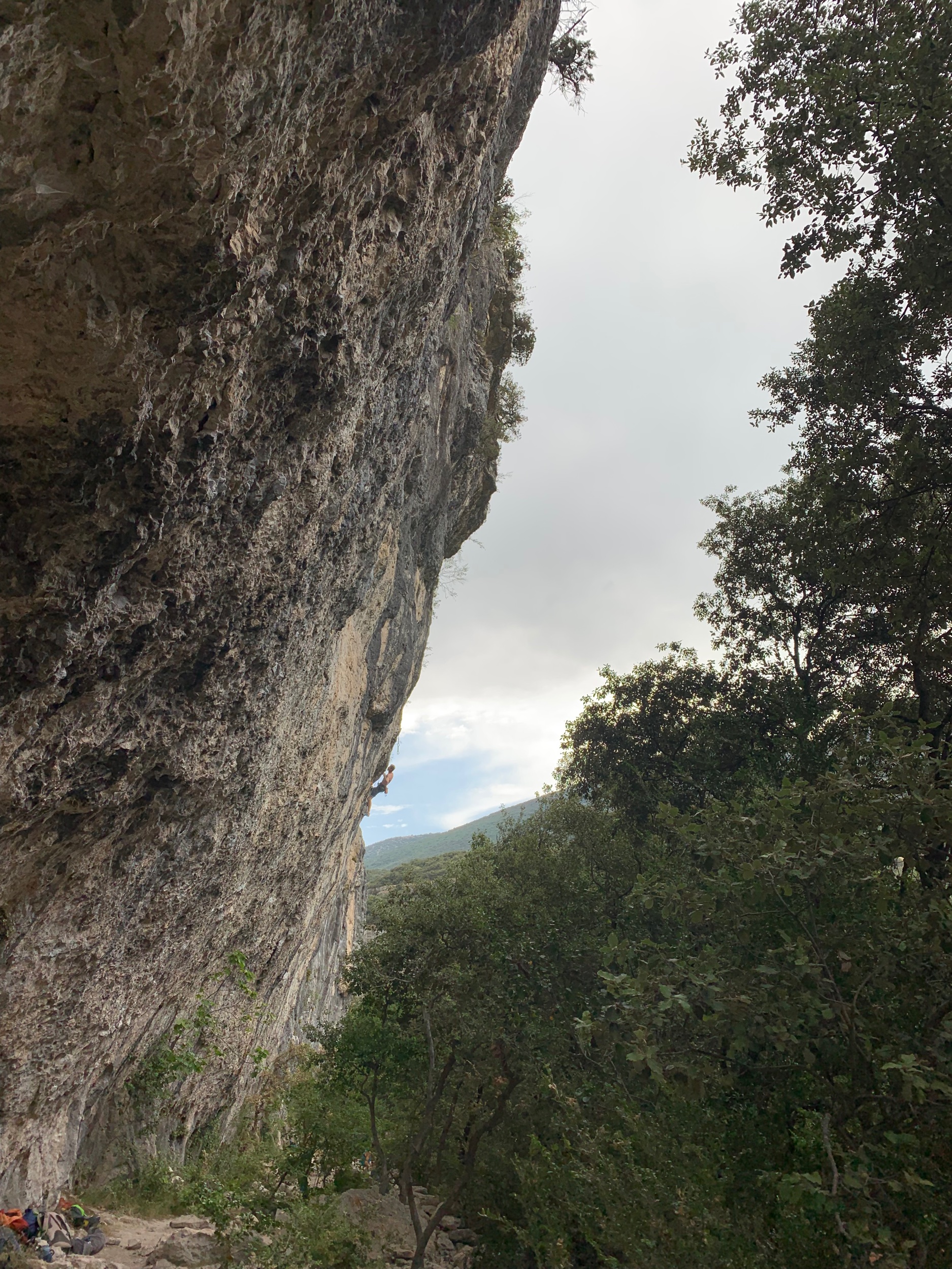 Unknown strong french climber on one of the many harder routes of the north-facing crag of Saint Leger.