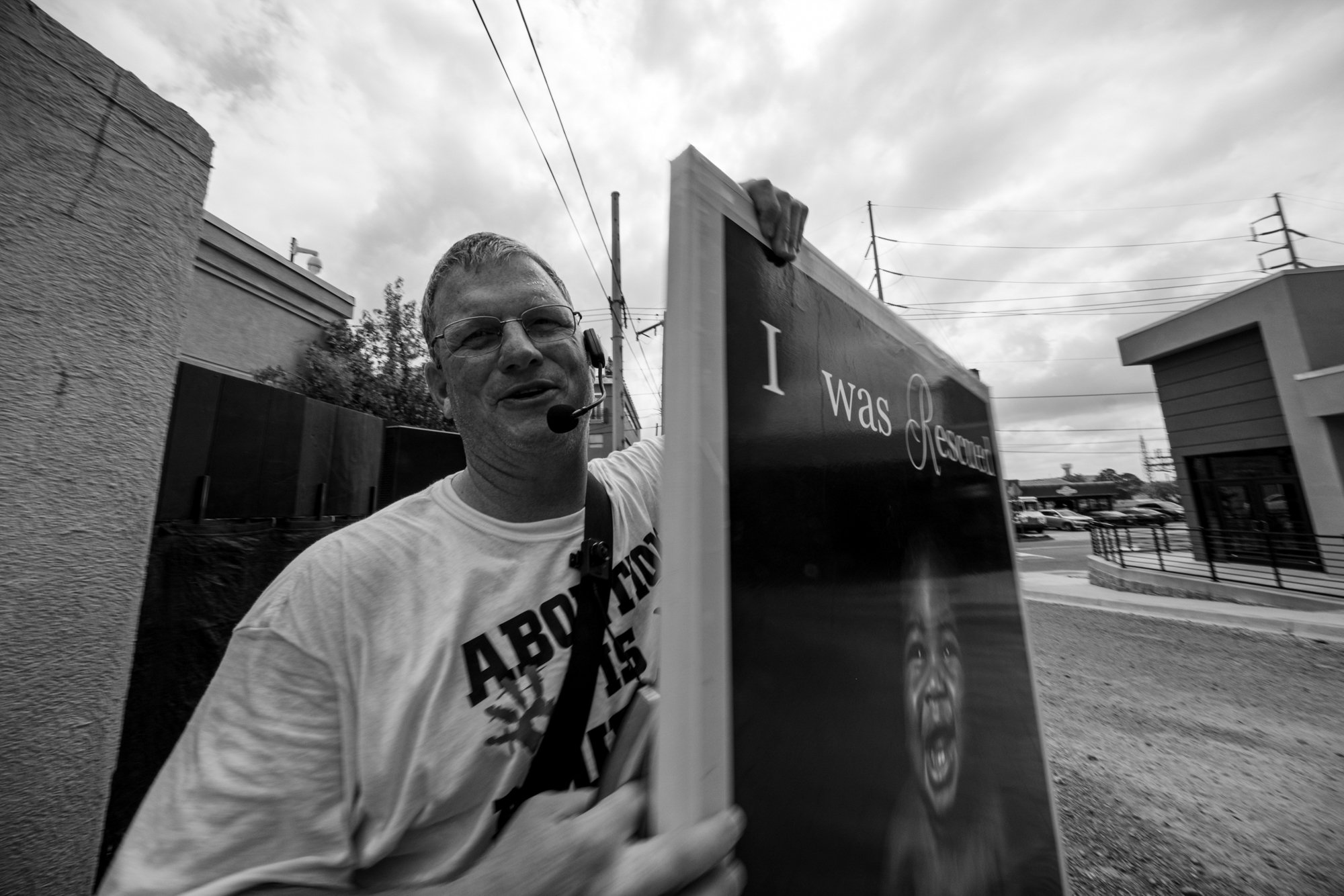 Pastor With His Poster