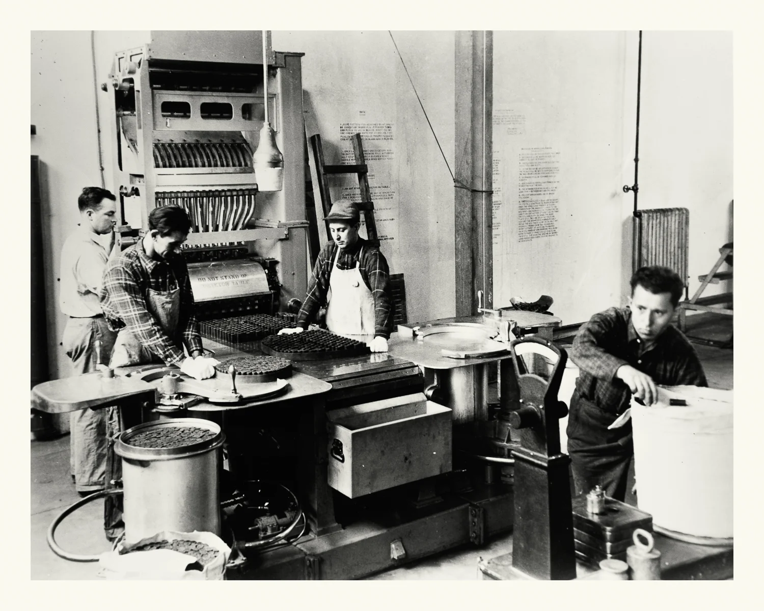 Photograph No. PD 141. “Photograph depicting workers assembling 16” powder stacks for ammunition, at the Hingham Naval Ammunition Depot.” c., 1940 Records of Naval Districts and Shore Establishments, RG 181, NARA Boston.