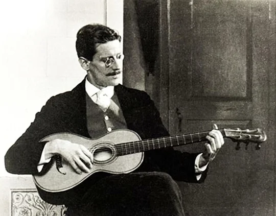 Joyce and guitar.jpg