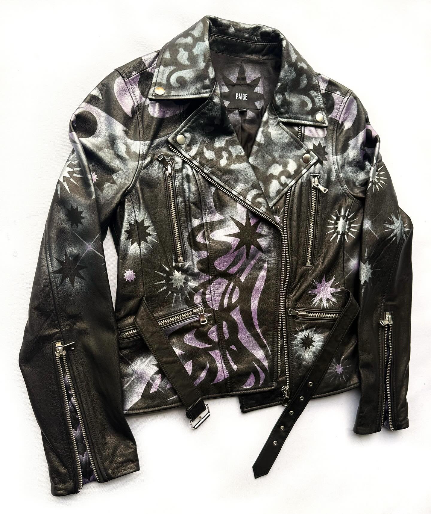 This is a recently commissioned Paige black leather women&rsquo;s motorcycle jacket, that features asymmetrical Baroque lavender patterning. Contact @erinbrammer to commission a garment. #custompaintedjacket