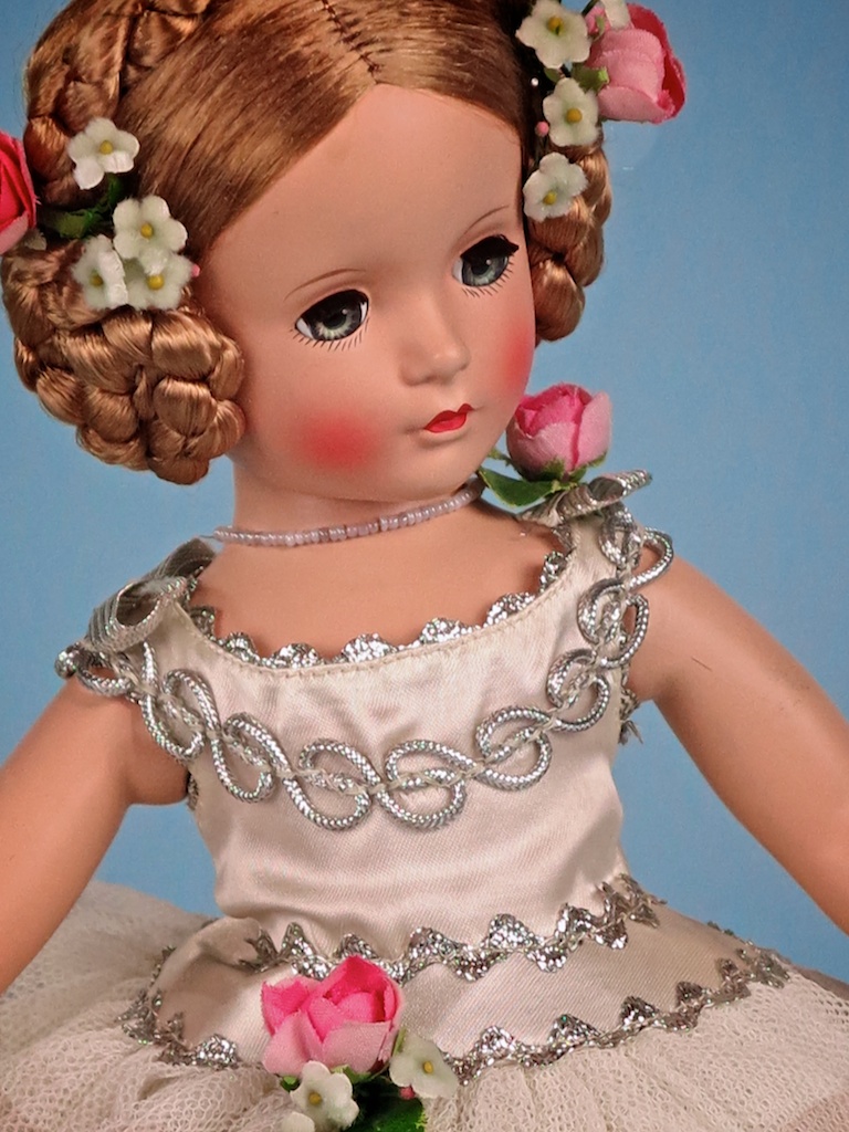 No, 6. A wonderful example of the very rare 14" 1948 "BALLERINA". Featured in the 1848 FAO Schwarz toy catalog, the doll is based on the star ballerina of the "SWAN LAKE" ballet. "BALLERINA" came in two sizes: FAO no. 16-58 ($10.00) for the 14" doll; and FAO no. 16-70 ($13.95) for the 17" doll.
