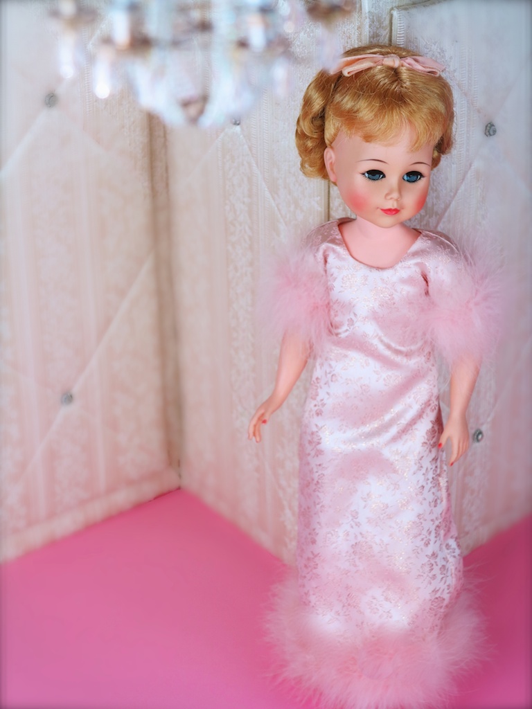 No. 7. 1966 COCO No. 2030: Ice pink brocade sheath ball gown, trimmed with matching pink marabou. Produced as both a portrait doll and as "COCO." Described in the company catalog: "considered on the the most dramatic and attractively dressed mold of all times, and is a perfect fashion companion for all growing girls."