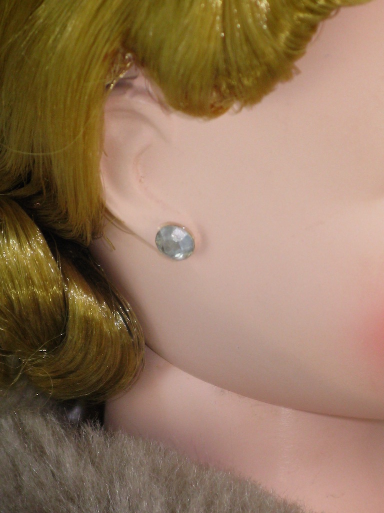 An interesting detail - The earrings for Cissy No. 2041 are simply a rhinestone glued to the dolls ear. Madame used this technique a couple of times with her earlier Cissy's of 1955 and 1956.