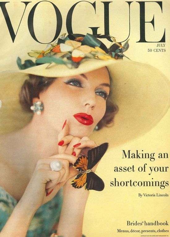 In this Vogue cover, the picture hat is trimmed with butterflies, flowers and leaves.