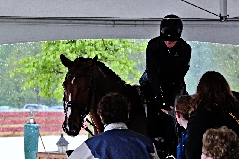  Olympian Leslie Reid and Fine and Smart escaping to the hospitality tent during a short hail storm! Photos by Courtenay Fraser WJH Dressage BC