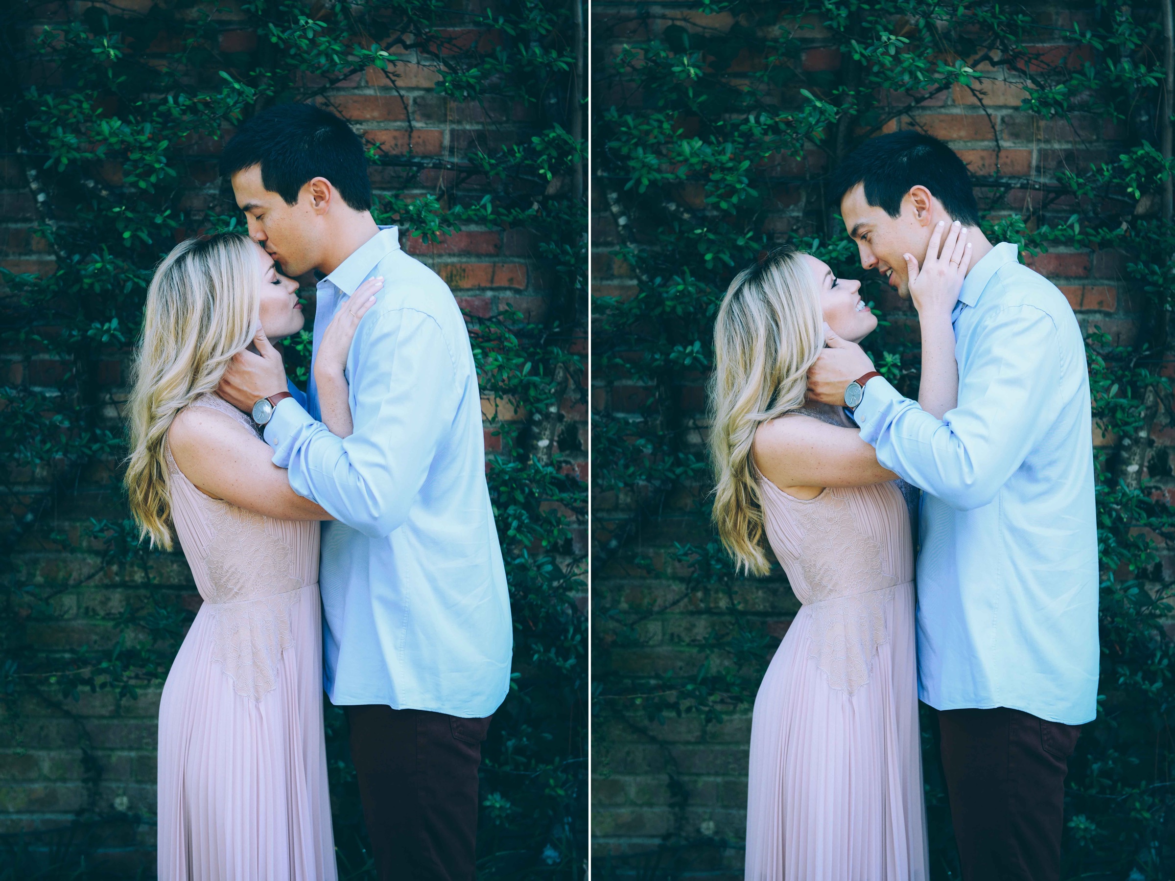 couple in front of vines on brick