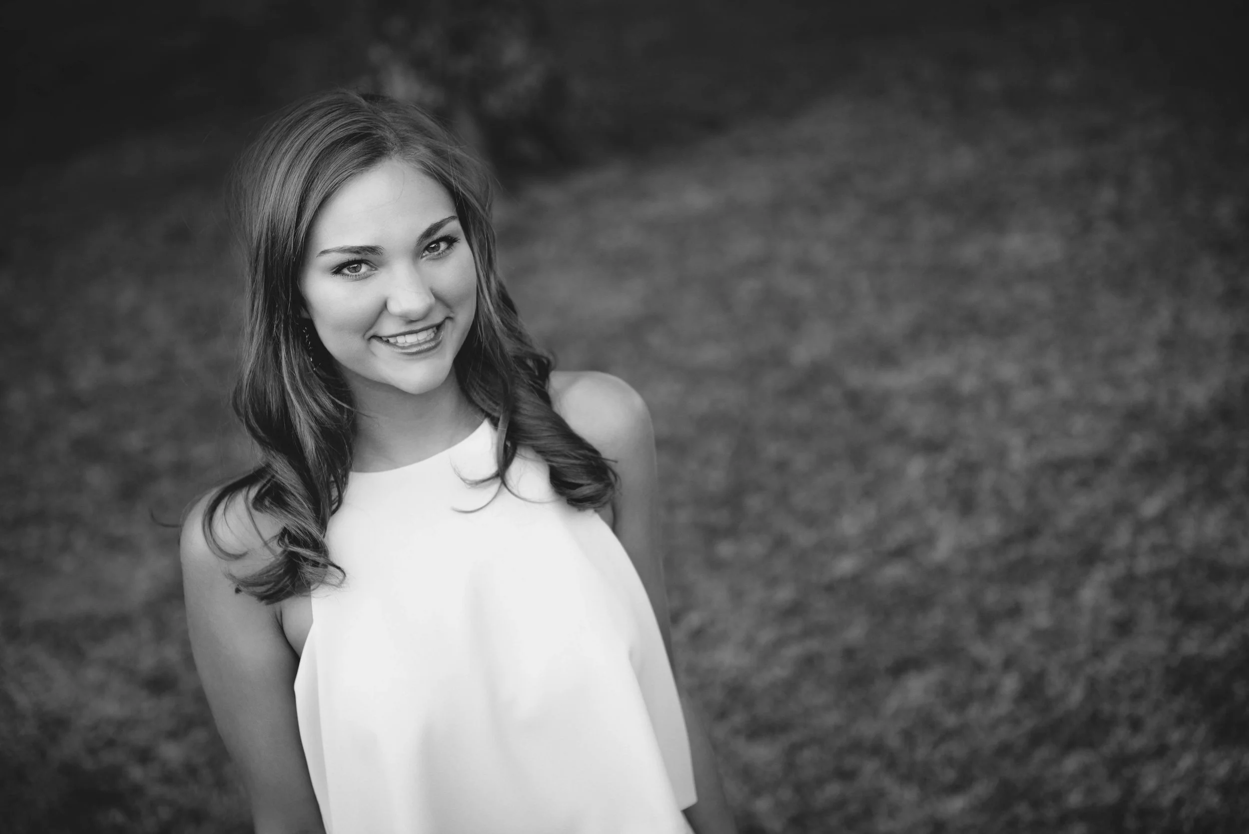 black and white portrait of girl in dress