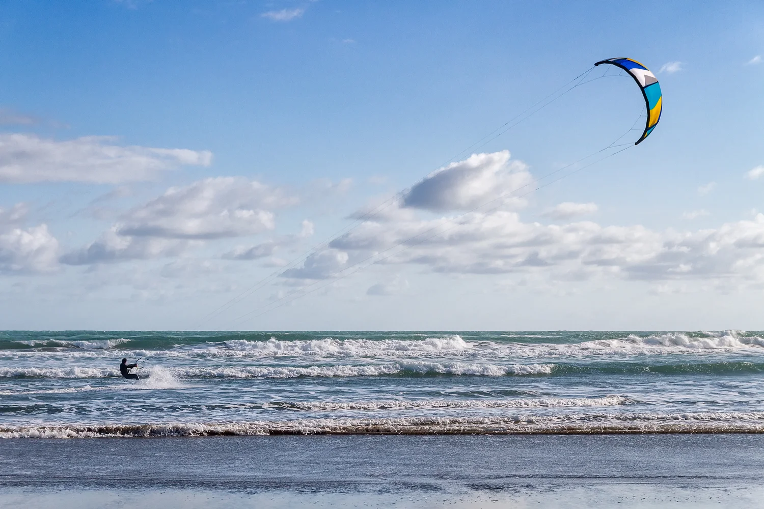 The place has loads of kite surfers, it appears kite surfing is now more popular than regular surfing.