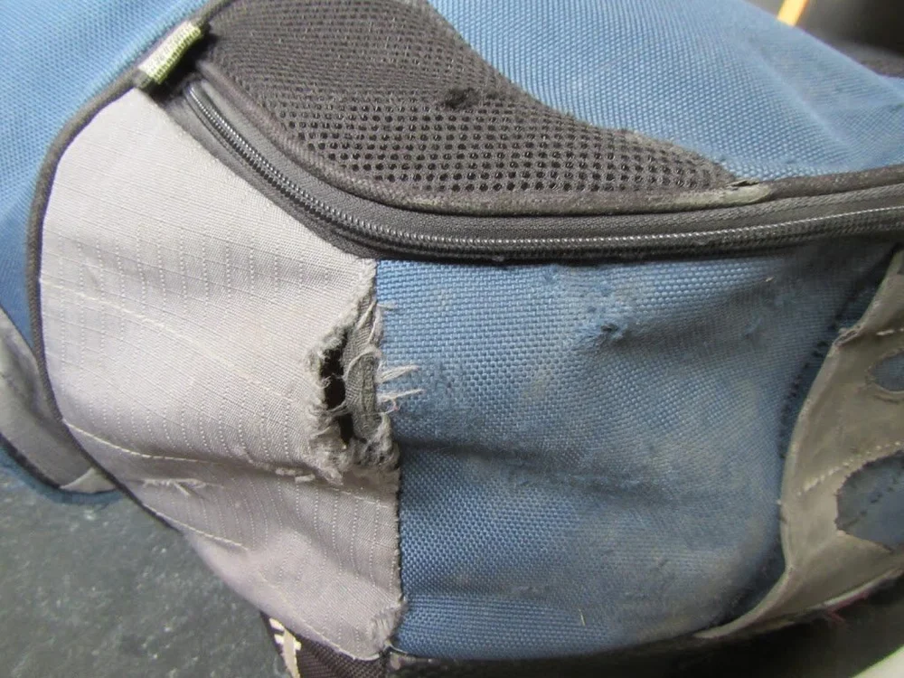 ripped backpack.jpg