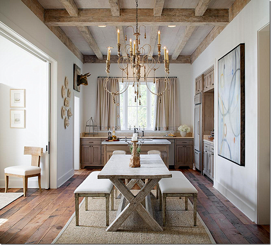 Another bull mounted high overhead. Interior Design by Annelle Primos. Photo by Chipper Hatter via here .