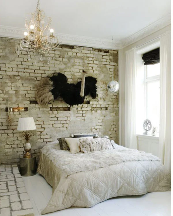 Nothing says "sweet dreams" like a taxidermy ostrich (above) mounted over your pillow. I'm not going to ruffle feathers by shooting down this look, am I. More taxidermy stuff here .