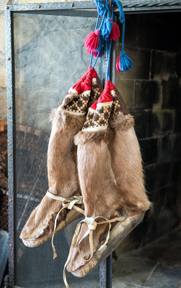 A pair of Inuit moccasins made from elk skins which is so tough, Inuit women had to chew the leather to make it pliable. The top of the boot is made from beaver interwoven with wool.