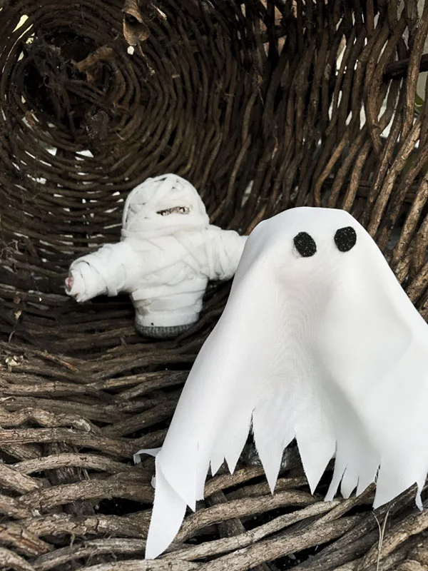 Okay, the Walter and George finger puppets were challenging to costume because a) Walter has huge hair and a knitted cap and b) George has headphones knitted permanently on his head. I know that ghost and mummy costumes are cheap and easy, and I used to scorn the parents who resorted to such unimaginative shortcuts but hey, I'm open to suggestions.