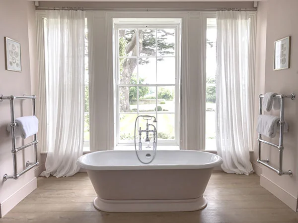 Nothing makes you feel more youthful than soaking in a tub the color of a nymph's thigh while gazing upon the gnarled branches of a two-hundred-year-old cedar out the window.