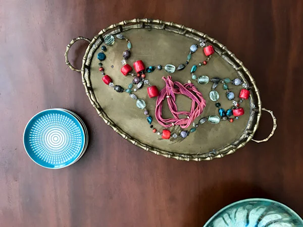 One of Margaret's original Bhati Bead wraps. This one is strung with tiny brass nuts -- a reference to her father who once manufactured them.