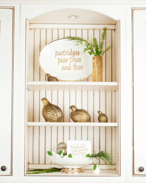 This Christmas vignette just might be my favorite. I used a laser cutter to create the words and then I affixed them onto the platter with double-stick tape. Easy peasy but here's the DIY tutorial if you're interested.