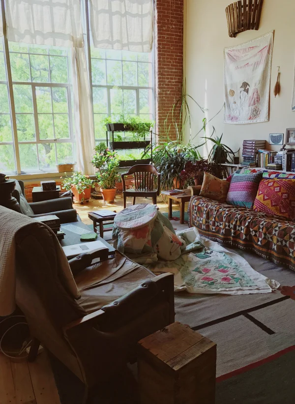 Natural light pours in through the factory windows, ideal for a woman with a reputation for making tiny and precise stitches. Looking out beyond the trees, one can see Alabama on the other side of the Chattahoochee River.