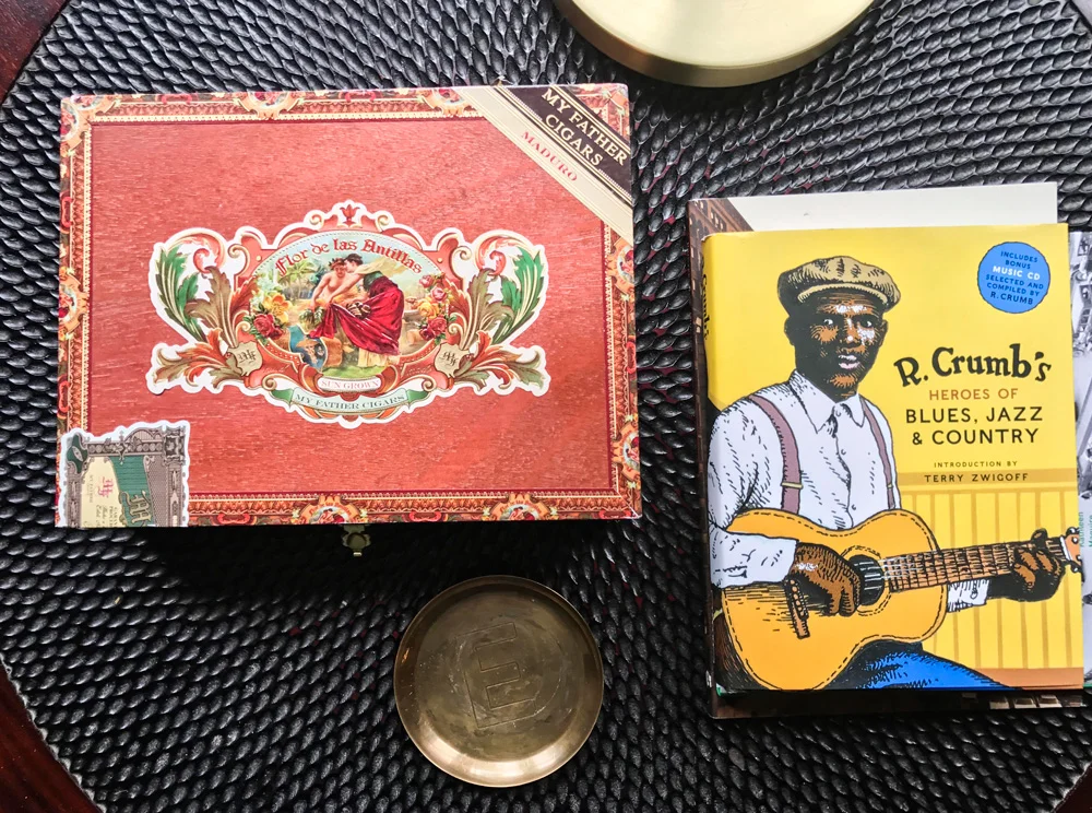 The cigar box contains the television remotes.