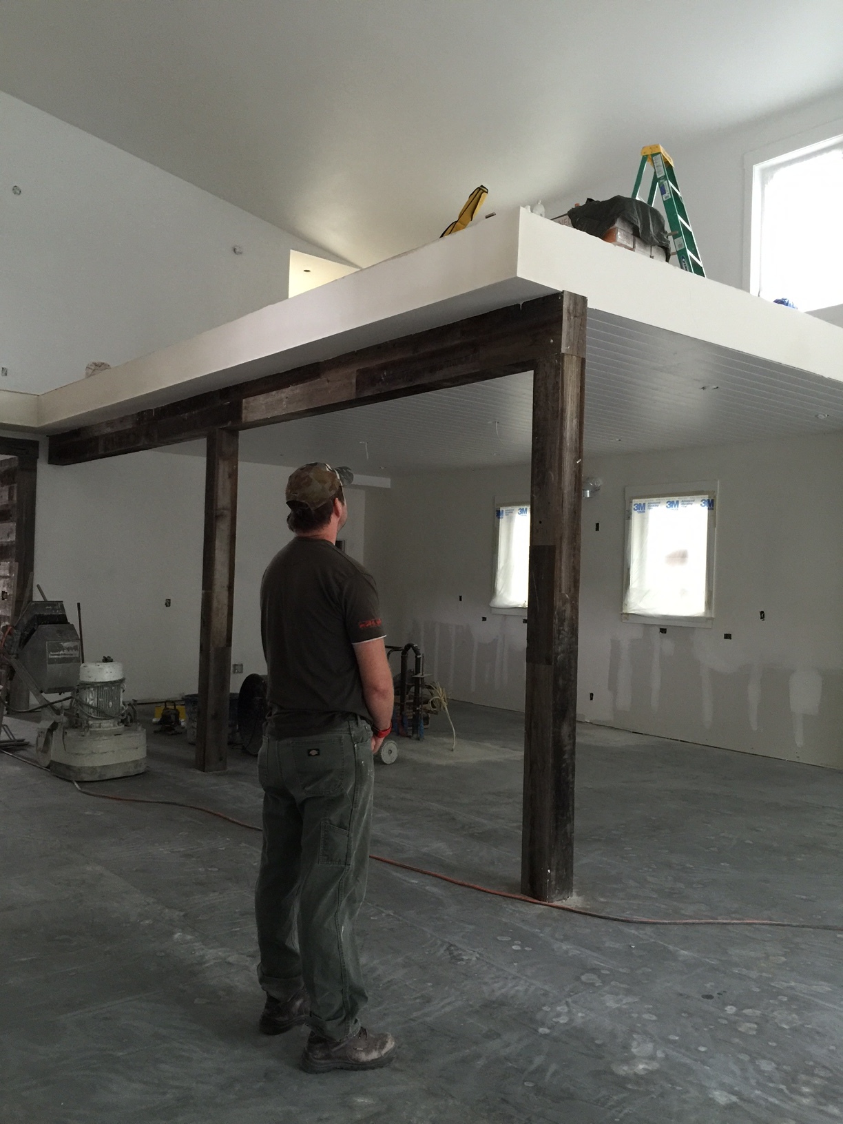 General Contractor, Steve Clark, inspects his team's work.
