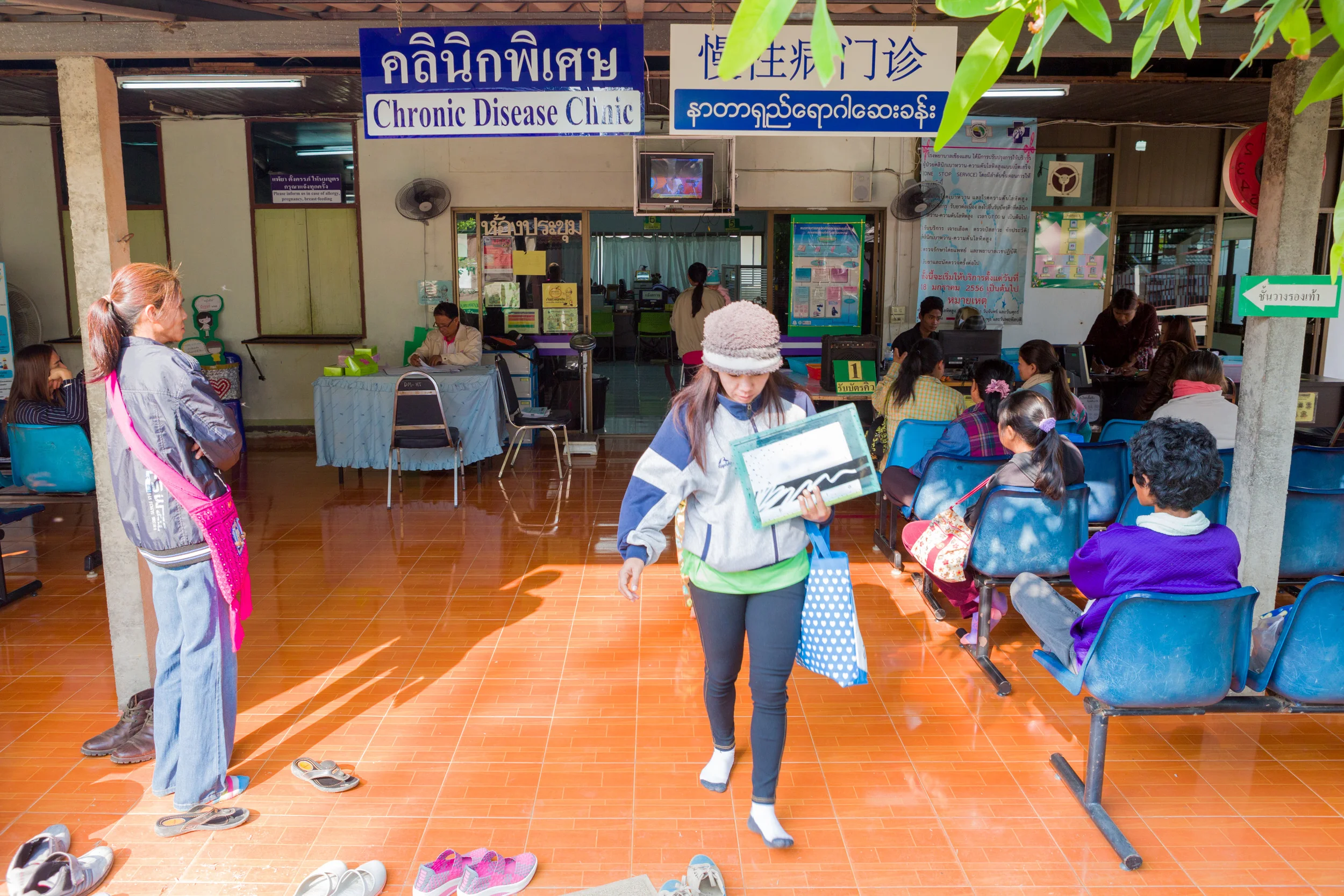 More than 900 people come to the Chiang Saen District Hospital "open" clinic for HIV testing and care. There is also a "closed" clinic, for those who want to maintain confidentiality.  