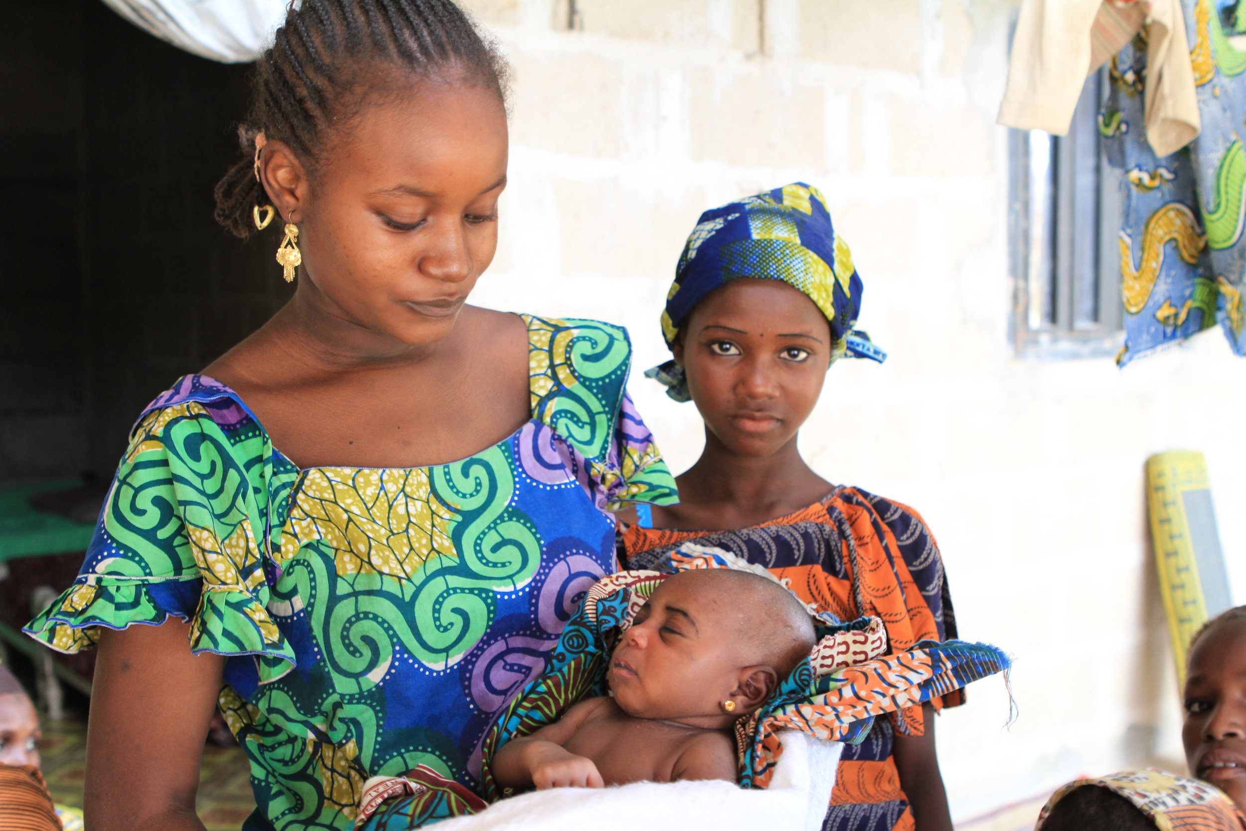 Her older sister came out with this baby. This was hard, as the baby was really really sick. We offered some money so she could take the child to hospital. I don't know if the baby made it. The father in the house was a Boko Haram member, I learned later. 