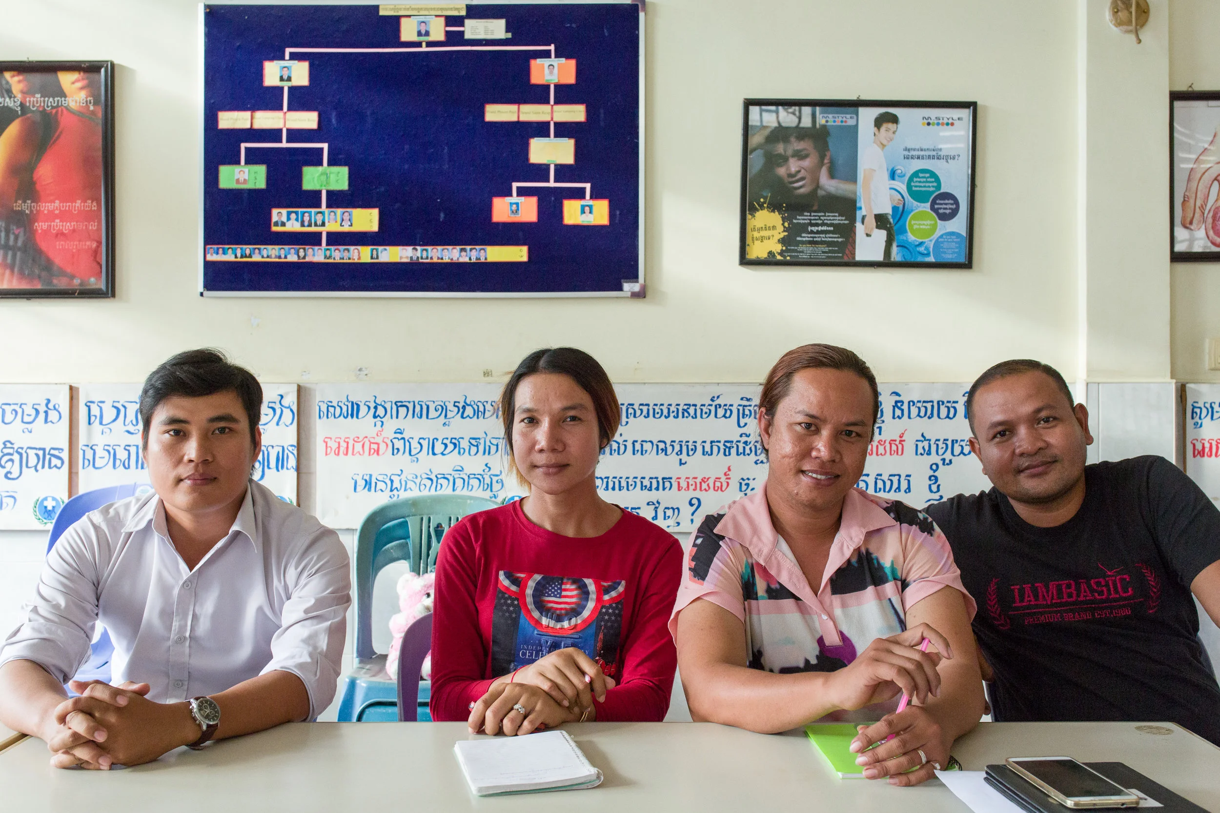 With some of their colleagues at the Men's Health Centre in Phnom Penh. 