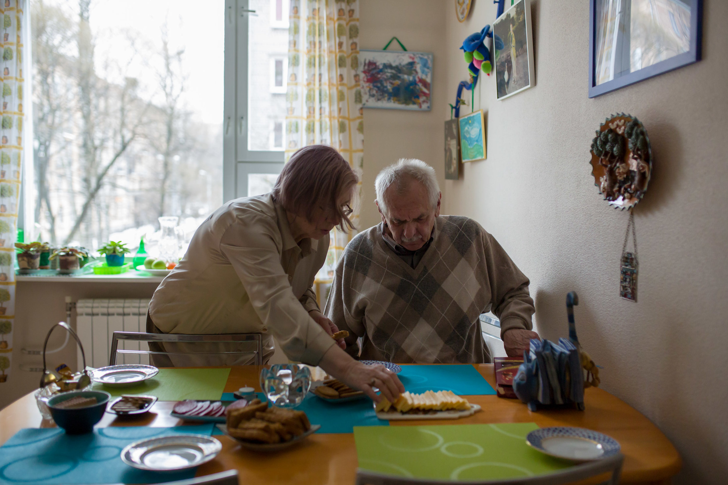 Doctors Mary and George Oblapenko in their St. Petersburg apartment. George spent a decade coordinating the effort to end polio transmission in the World Health Organization European Region. 