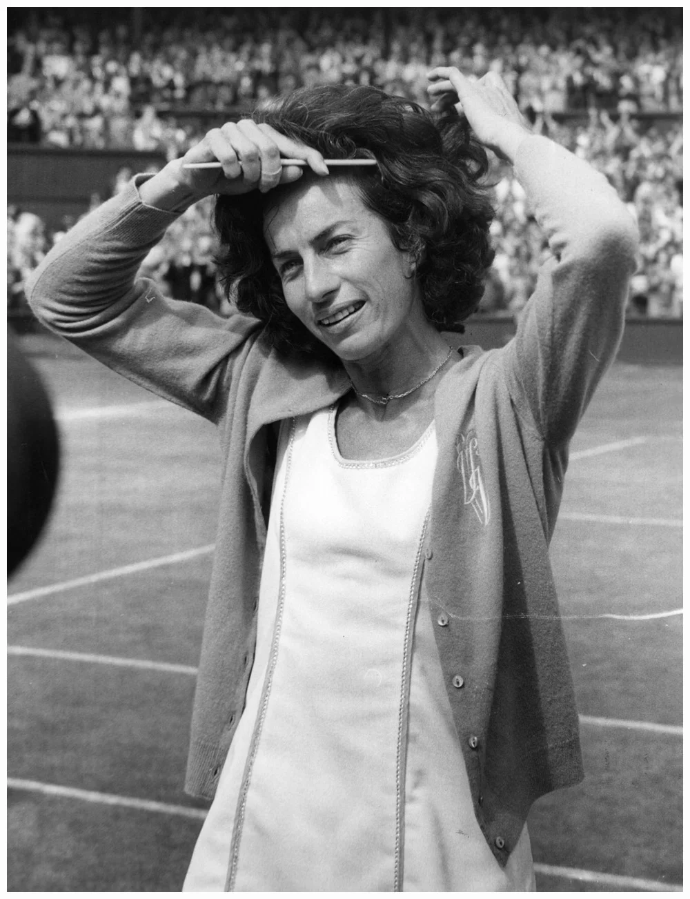 British tennis player Virginia Wade combing her hair as she prepares to meet the Queen after her victory in the Women’s Singles Final at Wimbledon. She beat the Dutch player, Betty Stove.