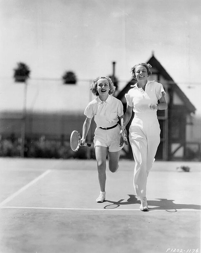 Alice Marble (right) was the darling of international tennis and social circles in the 1930s. She was the top-ranked female tennis player in America from 1936-1940, winning five Wimbledon and 12 U.S. Open titles in singles, doubles, and mixed doubles. The first lady to serve and volley, and noted for aggressive play called the "killer instinct" approach.s Her public life was filled with success, but her private life was a different story. Marble was fatherless at six, raped at 15, and diagnosed with tuberculosis at 19, just as her tennis career was taking off. A genuine “comeback kid,” she overcame obstacles that would have defeated a lesser person. After the biggest personal trauma of her life, she consented to undertake a spy mission for the U.S. Army during WWII. 