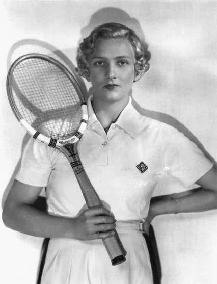 Helen Jacobs's lasting footnote at Wimbledon is as the first woman to popularize man-tailored shorts as on-court attire. ''It seemed the sensible thing to do,'' she would say later. Jacobs's admirable courage and fighting qualities earned her nine Grand Slam titles, and a triple crown of singles, doubles and mixed doubles at the 1934 United States Nationals. She was ranked in the world Top 10 for 12 straight times from 1928, was No. 1 in 1936, and was elected to the International Tennis Hall of Fame in 1962. Jacobs was a commander in United States Navy intelligence in World War II, one of five women in the Navy to achieve the rank of commander. She retired from tennis in 1947 and enjoyed a career as a writer of 19 books, a farmer and a designer of sportswear.Jacobs is survived by her companion, Virginia Gurnee.