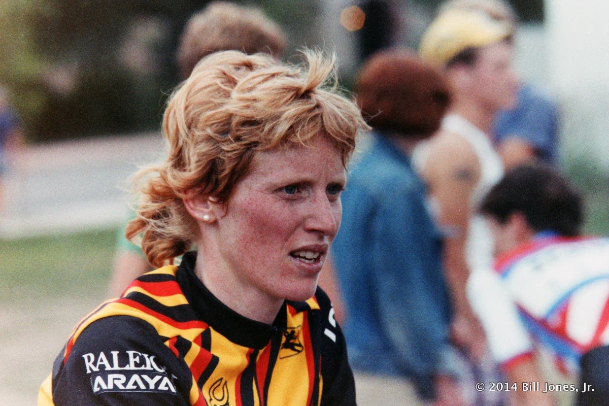 Connie Carpenter holds the distinction as the first women cyclist to win an Olympic gold medal, which she did in winning the 1984 road race, the first Olympic cycling event for women. But as Connie Carpenter, this was 12 years after her first Olympic appearance, which came in speed skating at the 1972 Winter Olympics in Sapporo, when she was only 14-years-old. Carpenter was US national overall champion in speed skating in 1976, but injuries prevented her from competing at the 1976 Winter Olympics. She then turned primarily to cycling and won multiple titles, highlighted by a 1983 World Championship gold medal in the individual pursuit, after she had finished second in that event in 1982.