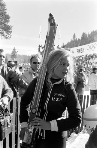The first American to win an Olympic medal in downhill skiing, Pitou took home two silver medals at the 1960 Olympic Games. As a high school freshman, Pitou ignored the 'no girls allowed' policy for the school's skiing team, hiding her hair under her helmet and going by the name 'Tommy'. Pitou made the boys' team, competing in several races until her helmet flew off in a crash, blowing her cover. Pitou continued to train, making the U.S. Olympics Ski Team at 17 and being mentored by fellow American Andrea Mead Lawrence. Following her skiing career, Pitou worked as a fashion consultant in the ski industry and established training schools in New England. Hilary Clinton has credited Pitou with teaching her to ski. Today, Pitou's eponymous travel agency, Penny Pitou Travel, leads skiing expeditions and tours throughout Europe.