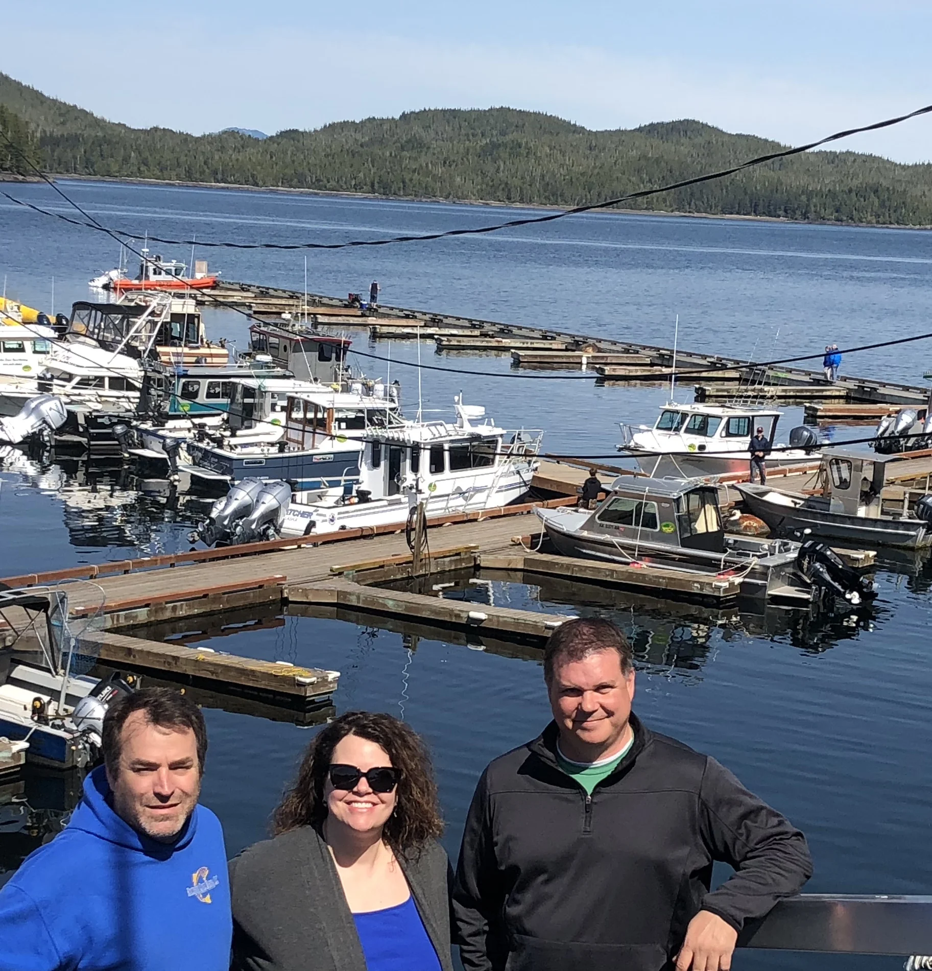 Michael & Linnaea Troina with Matt Burbank, who is taking over operation of Knudson Cove Marina