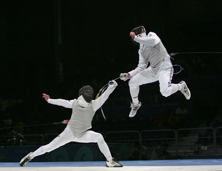 Fencing at the Athens 2004 Summer Olympic Games. Photo copyright by WFA's Serge Timacheff.
