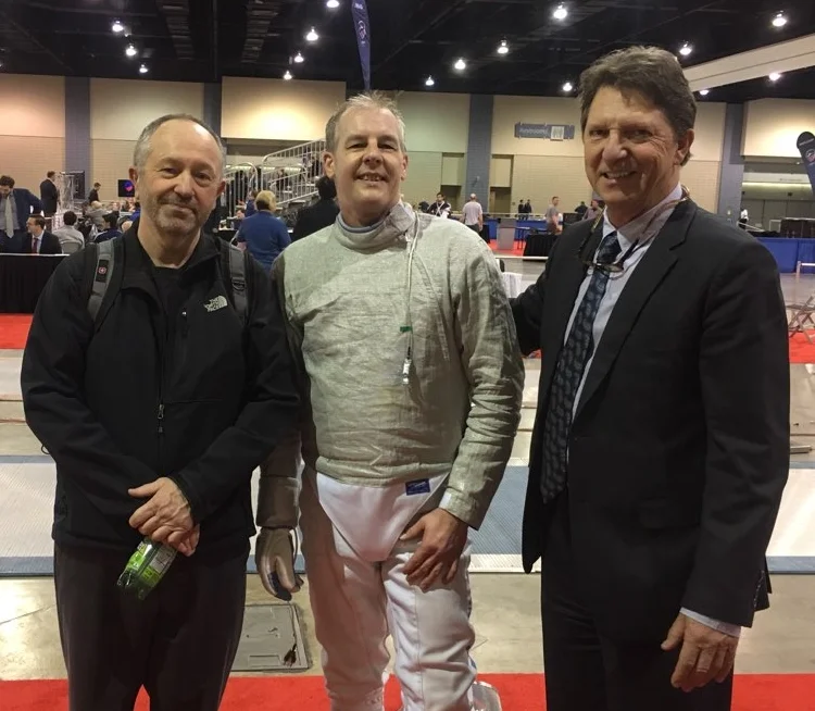 WFA veteran fencer Jeff Gueble, Coach Mark Lundborg, and Head Coach Atilio Tass.
