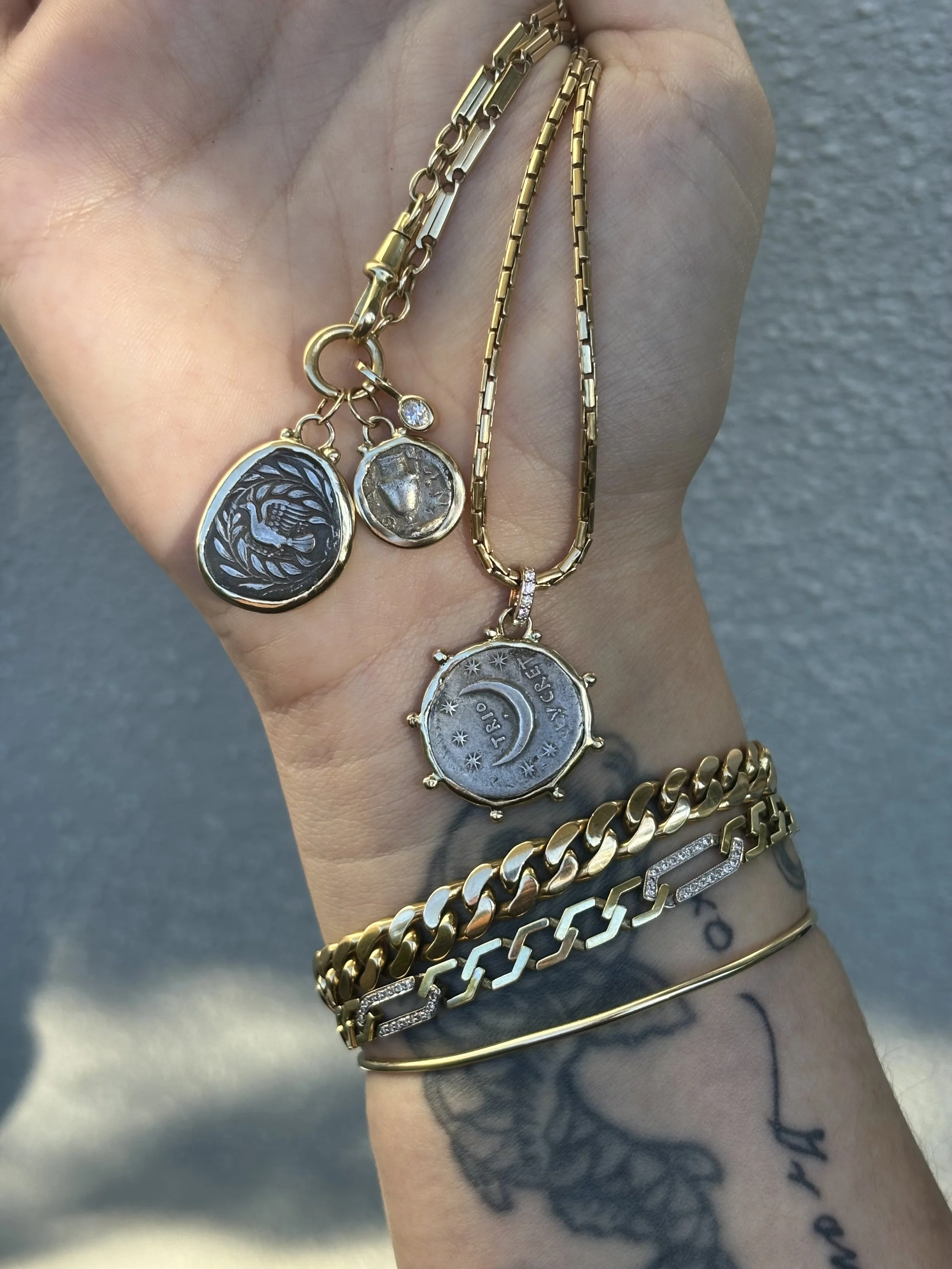 hand chain coin.jpeg