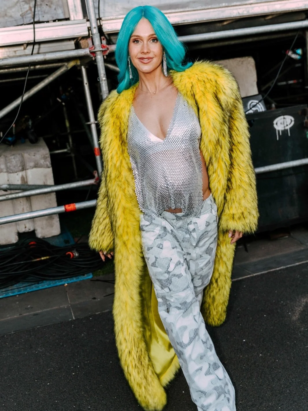 🏈 TOUCHDOWN 🏈

@djtigerlily channels MVP energy in @_zhivago_ &lsquo;s Mechanical Dolls coat and Glitter &amp; Gold top at NFL Kickoff Festival in Naarm 🎧🔥🎧

📷 @chris_pompei
