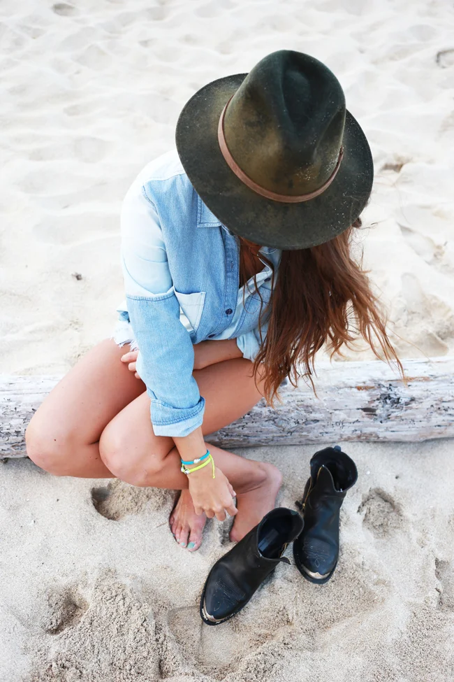 Shirt: Leith via Nordstrom , Shorts: One Teaspoon , Hat: Bailey , Boots: Golden Goose , Bracelets: pearl.love Jewelry