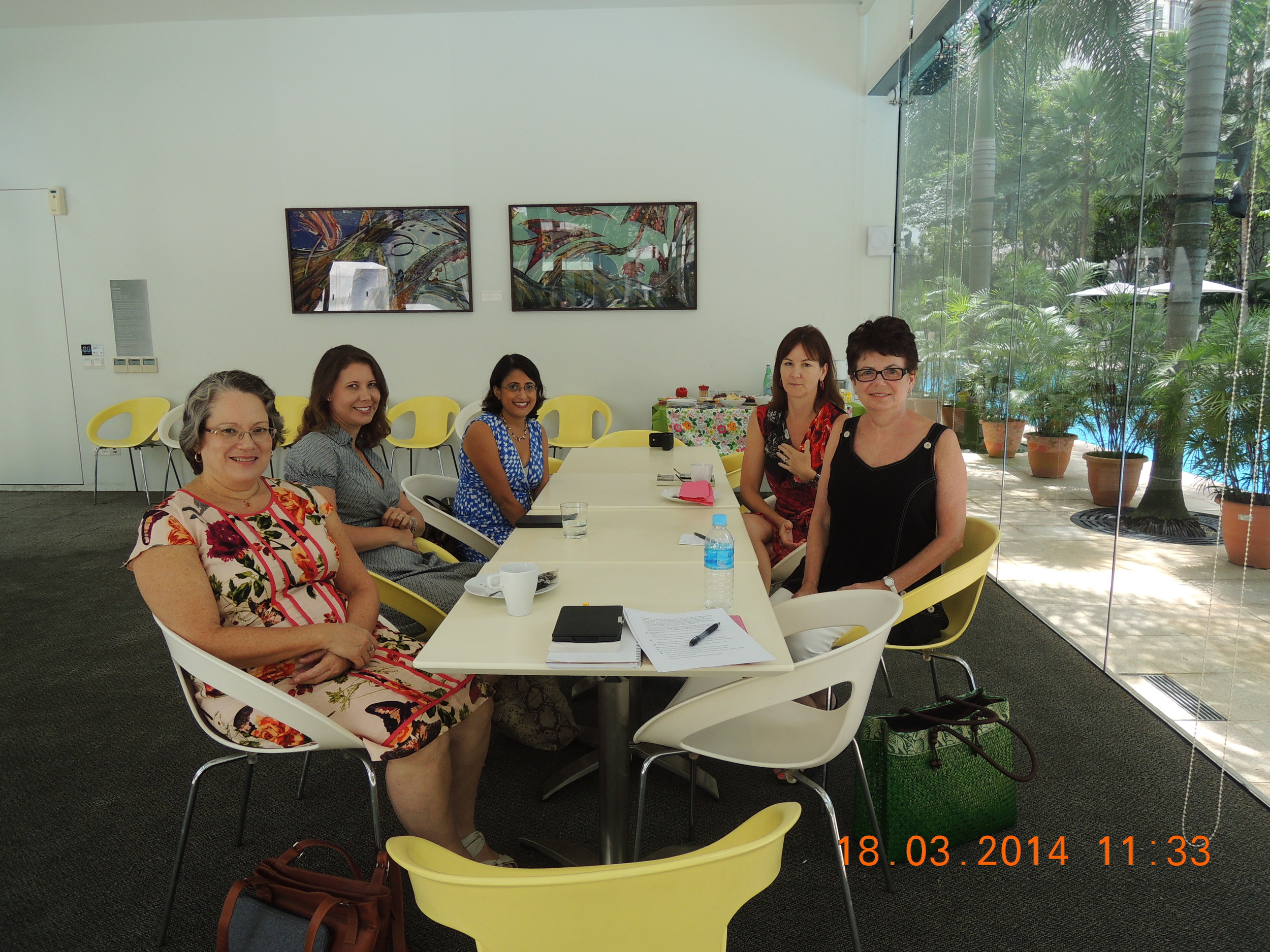 Judy, Beth, Sharmila, Kristen, and Donna--a good picture of you all! This is the meeting room in Donna's complex. At the back is a table full of goodies--thanks, Donna. The green bag on the floor next to Donna is mine. 