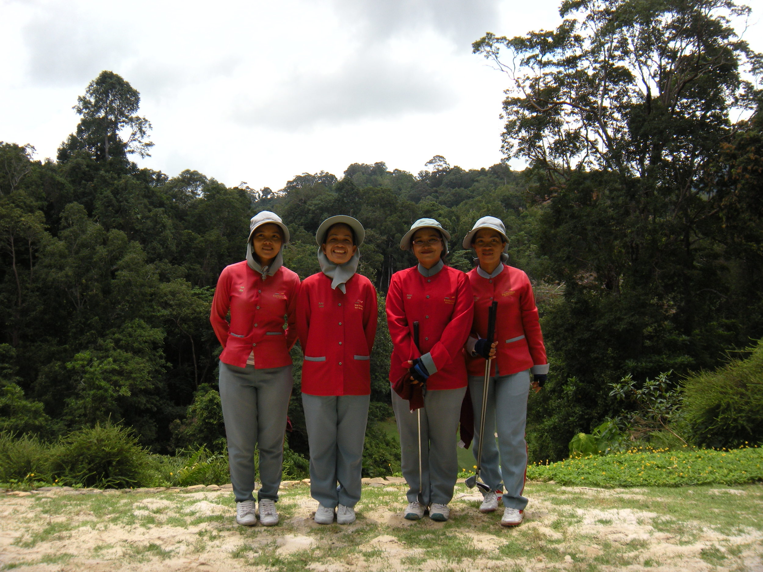 The caddies, covered to protect themselves from the hot, hot sun. 