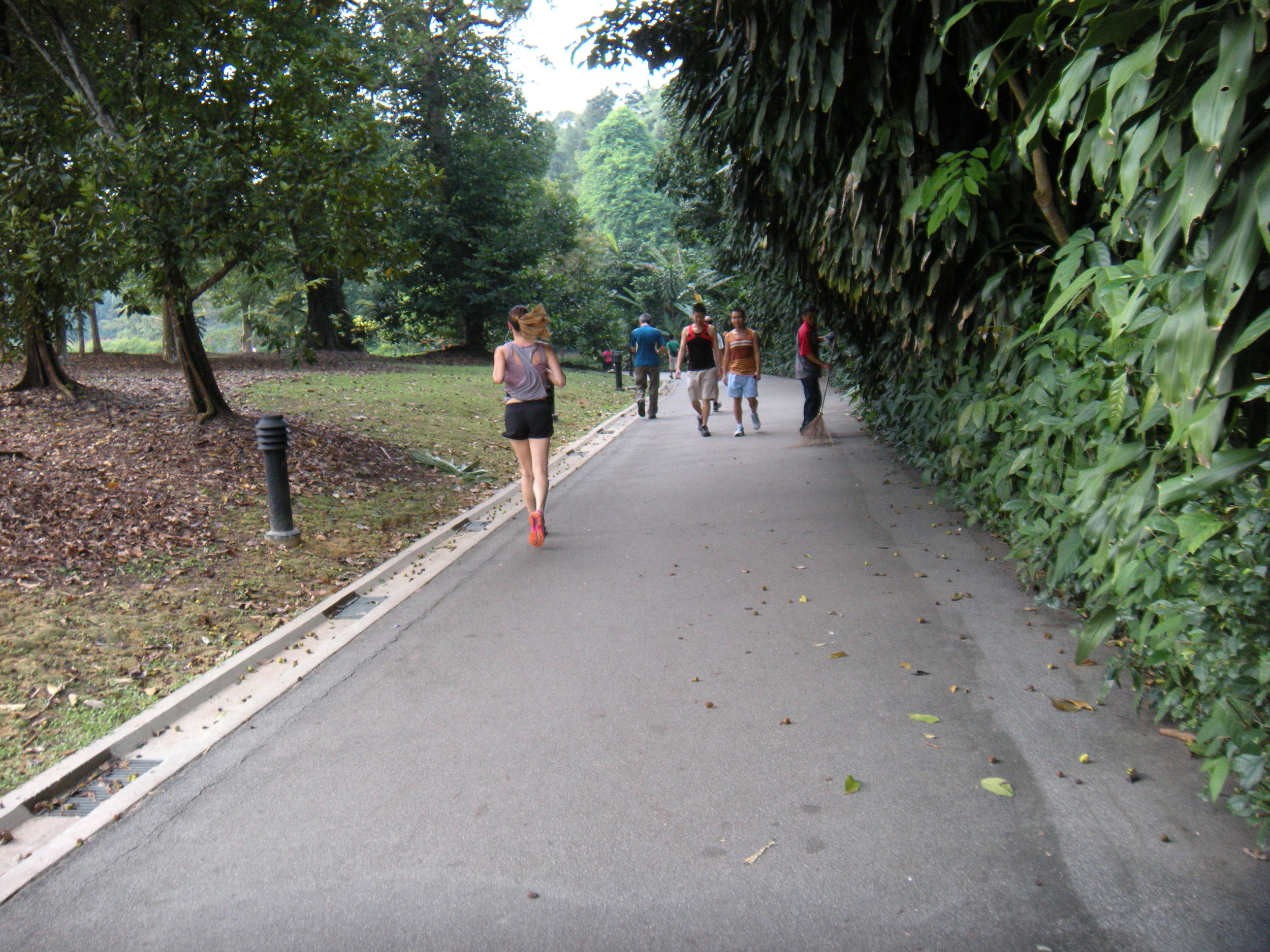 The woman running in the park.