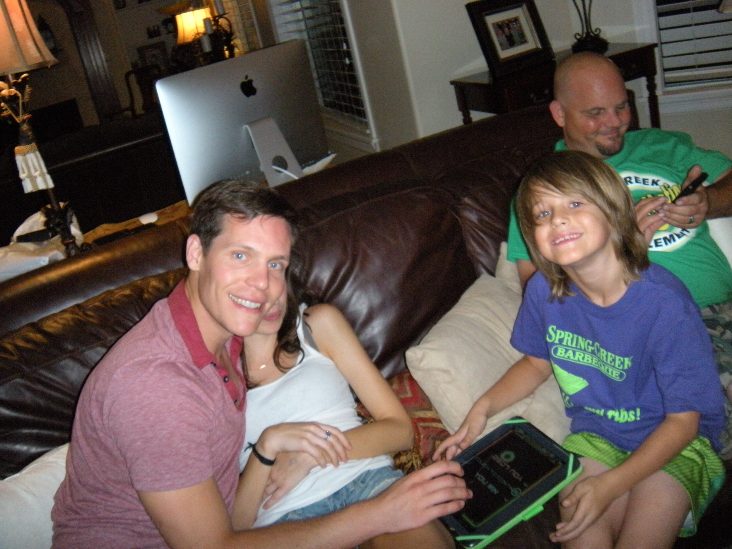 Curtis playing with Kedan. Anna's behind Curtis. That's Greg, Keri's husband, behind Kedan. 