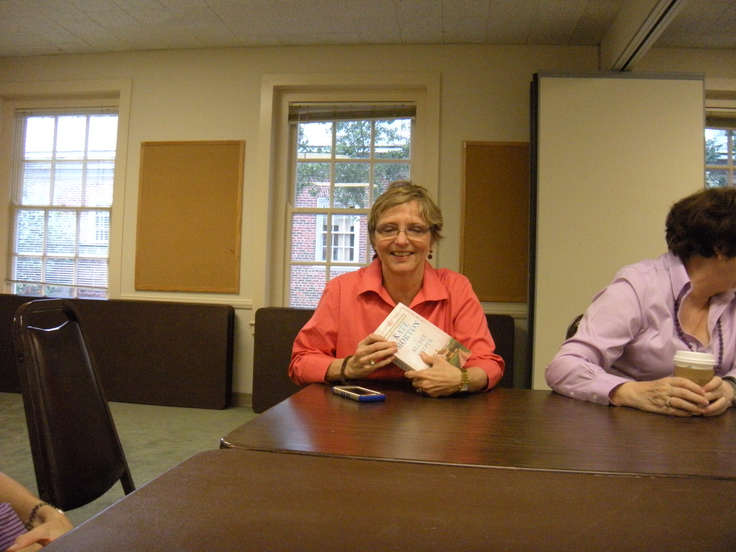 Sorry, Janet. This is a lousy photo--I usually do better.. Though your eyes look closed, you're actually looking down at the book as you speak about it.