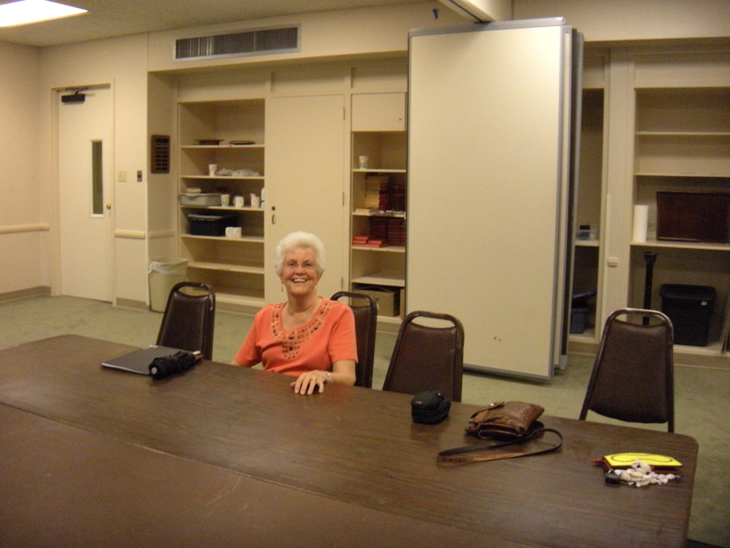 This is Dorothy. Though she's in pain with her back, she keeps smiling. Recognize my purse on the table? I've carried it everywhere for the last eight years. 