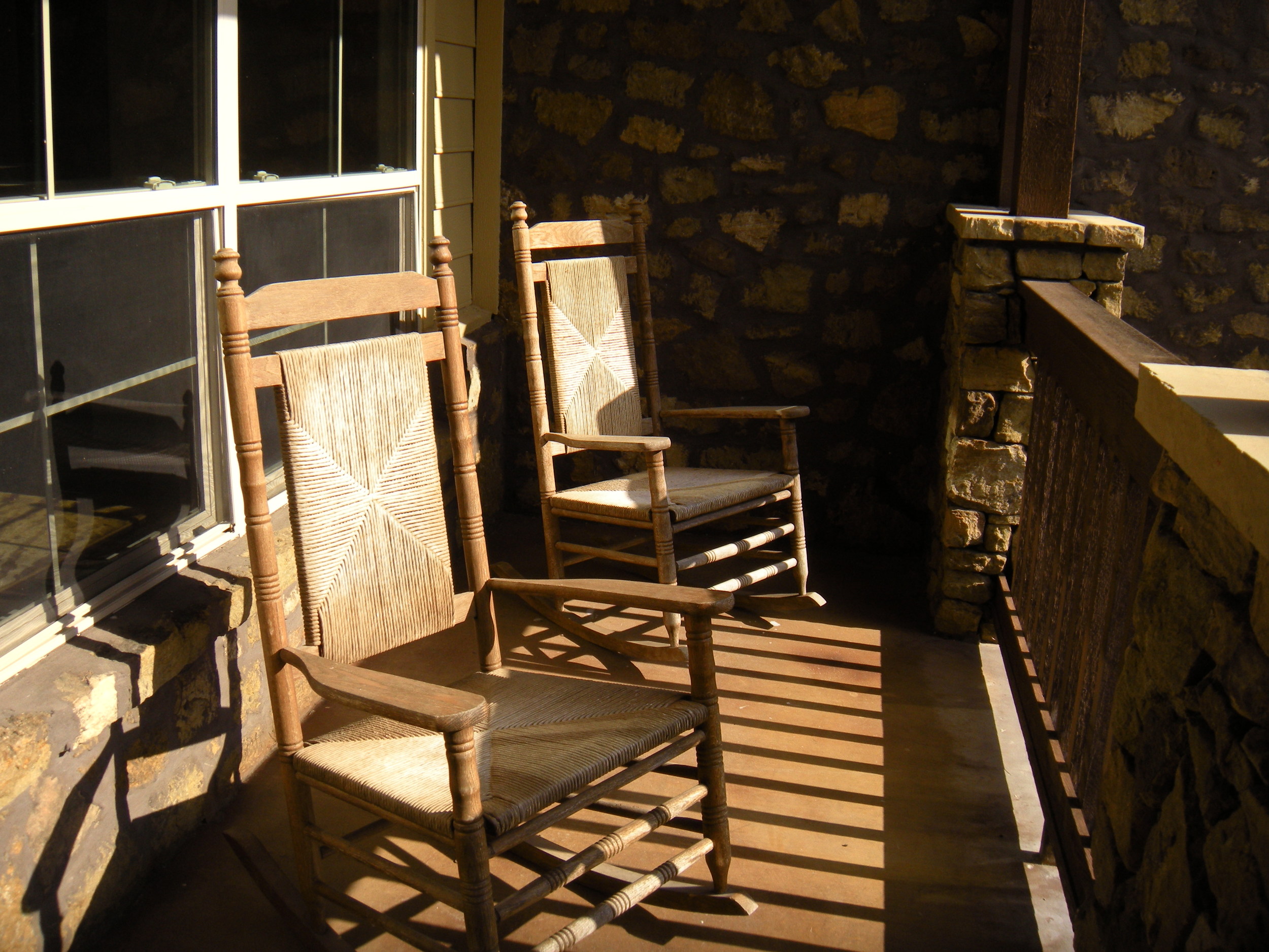 One side of our front porch. I assume they'll take the chairs. I'm thinking a porch swing. 