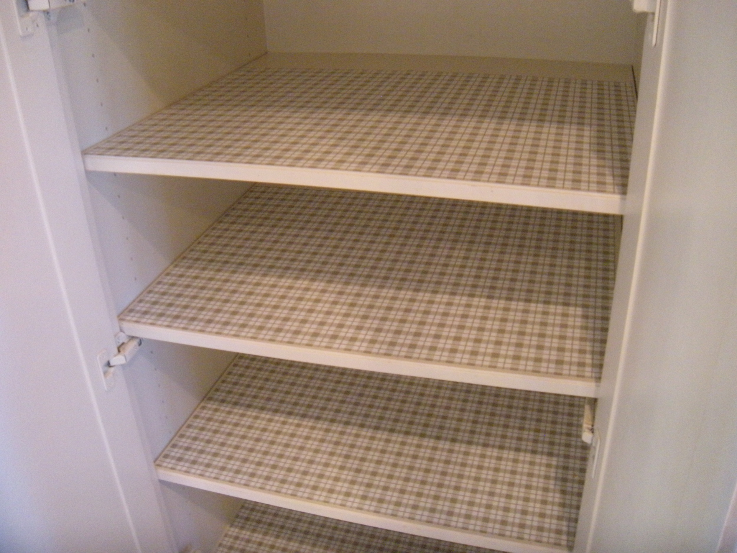 Shelf paper makes the shelves look clean and ready to receive stuff. 