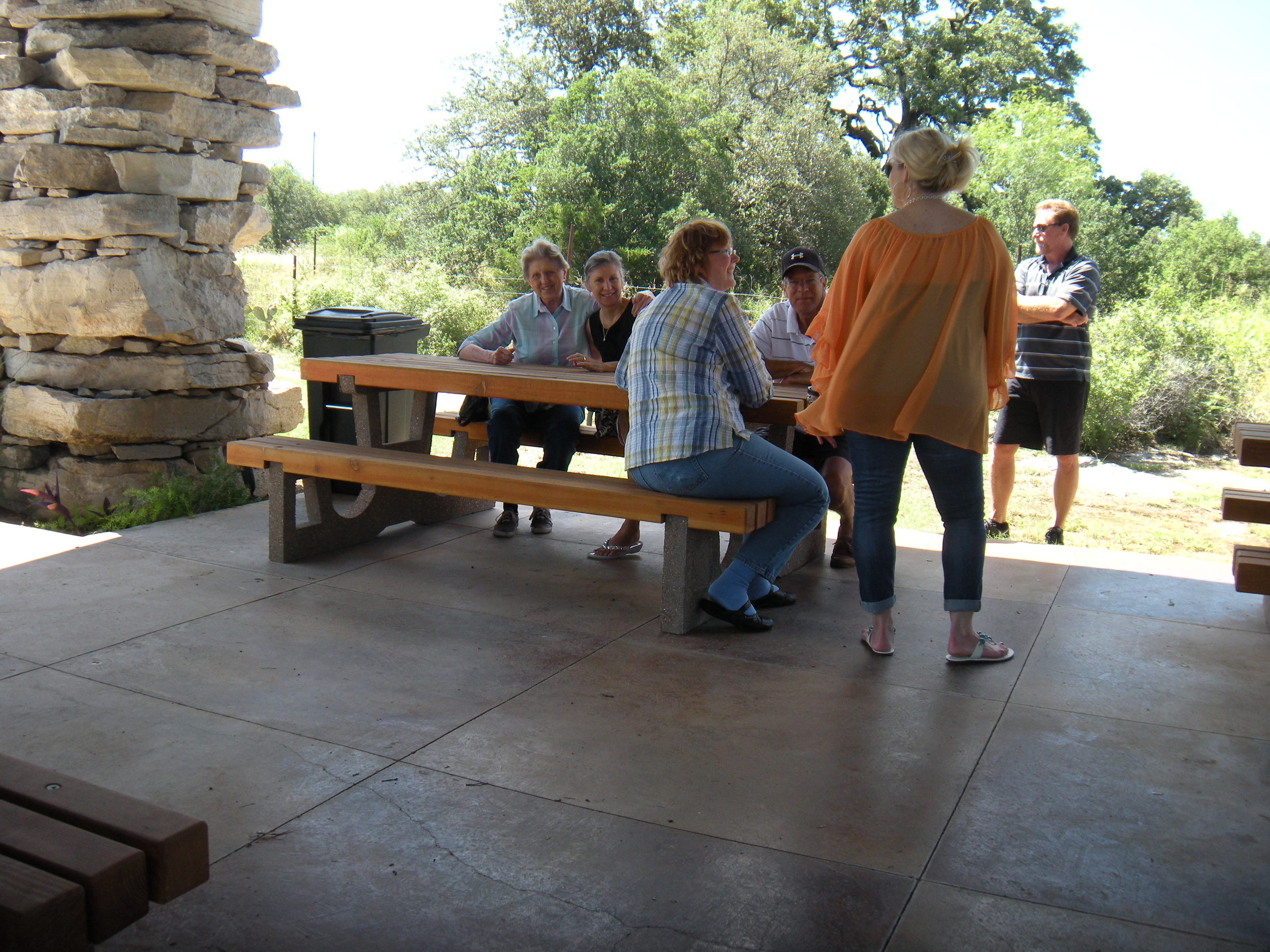The woman in orange with her back to me is the one who's mad at me. 